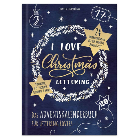 Buchcover mit weißem Kranz und goldener Handschrift auf dunkelblauem Grund. I Love Christmas Lettering – Das Adventskalenderbuch für Lettering Lovers: das perfekte Geschenk für jeden Weihnachtsfan!.
