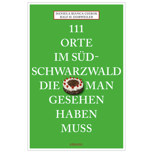 Grüner Bucheinband mit Schwarzwälder Kirschtorte und weißem Text: „111 Orte im Südschwarzwald, die man gesehen haben muss“ – ein Reiseführer, der Tradition, Moderne und abwechslungsreiche Natur- und Kulturlandschaften ver