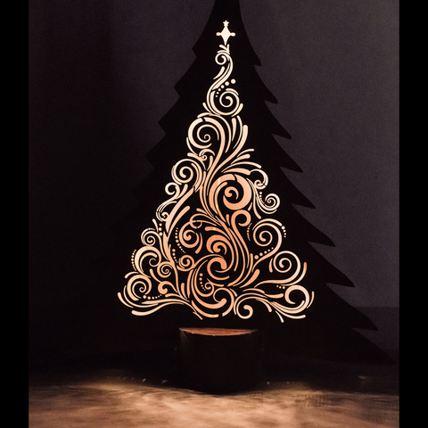 Der Baum Leander inkl. Beleuchtung ist ein dekorativer, LED-beleuchteter Weihnachtsbaumausschnitt mit wirbelnden Mustern und Edelrost-Optik, der auf einem Holzsockel steht und jedem Raum festlichen Charme verleiht.