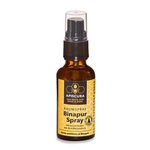 Eine braune Flasche Binapur Raumspray mit schwarzer Sprühdüse und gelbem Etikett, mit Propolis in einer naturreinen Lösung.