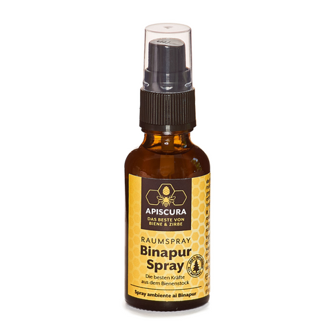 Eine braune Flasche Binapur Raumspray mit schwarzer Sprühdüse und gelbem Etikett, mit Propolis in einer naturreinen Lösung.